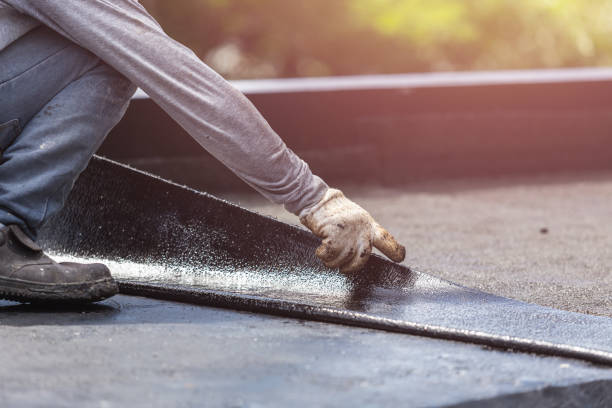 Professional Basement Waterproofing technician working in Petersburg, IL